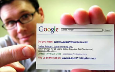 postcard of owner holding business card