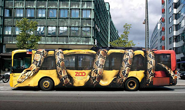 vehicle ad snake wrapped around bus copenhagen zoo