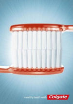 toothbrushes illustrate whitening power of colgate