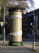 street marketing pole sign for laxative in germany