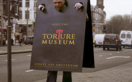 clever sandwich sign marketing for museum of torture