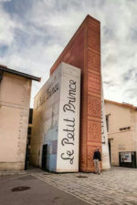 storefront of french bookstore resembles real books