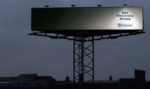 use energy wisely billboard that's only partially illuminated
