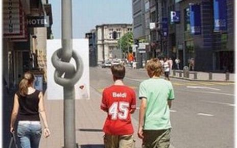 street light pole twisted in knot like a pretzel