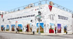 building mural with photos of popular travel destinations | delta airlines