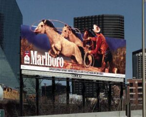 marlboro man billboard cutout roping horses